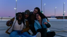 A group of friends hanging out, as one person struggles with people-pleasing.